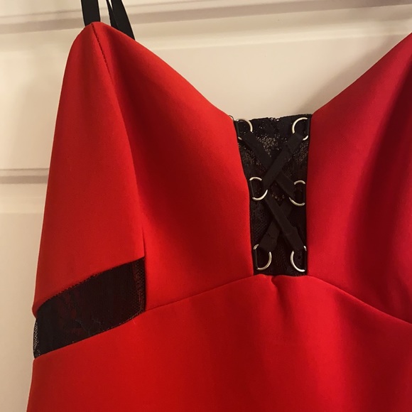 Parker, red peplum dress with black lace cutouts - Picture 2 of 3